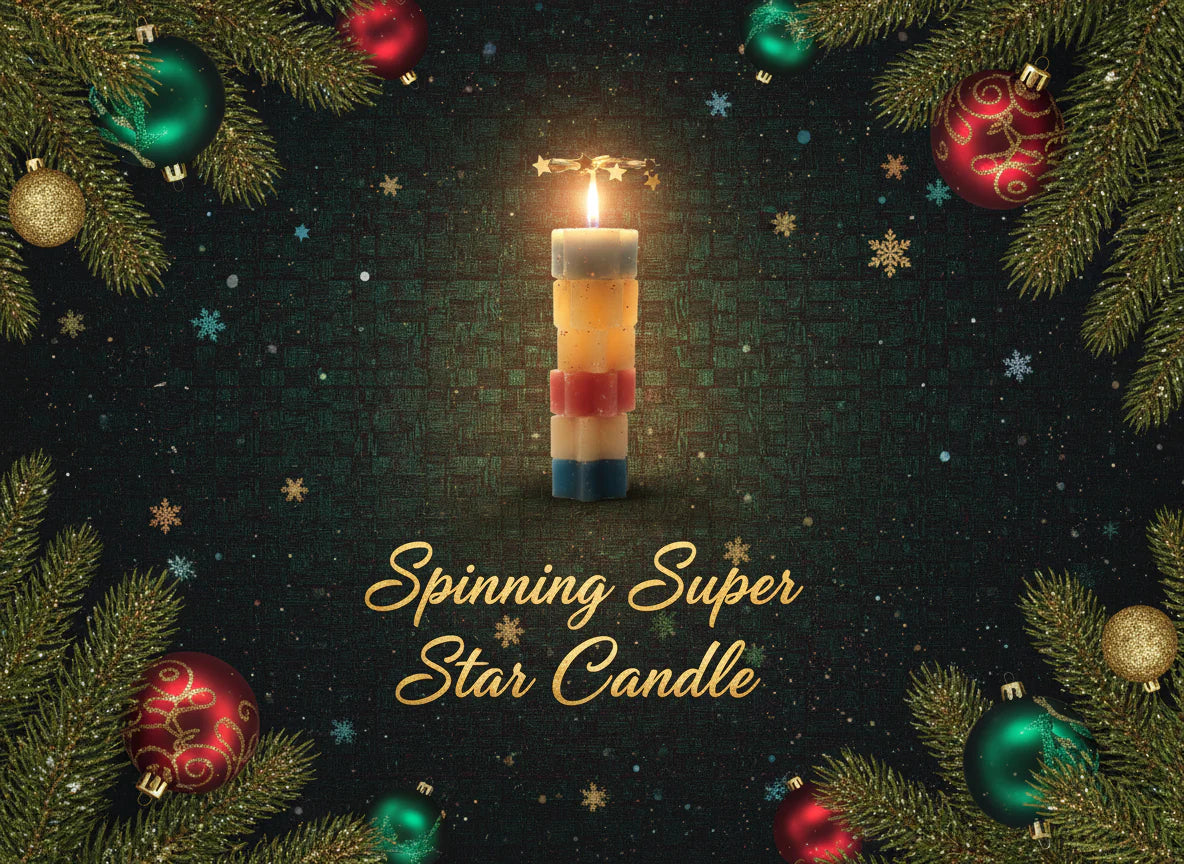 Spinning Super Star Candle surrounded by Christmas decorations on a dark background